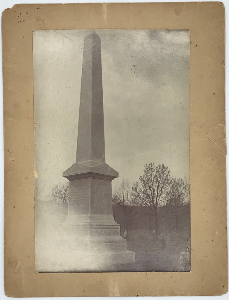 Item #53682 Monument erected in honor of 12 men, who were massacred by bushwackers [sic] during the Civil War, at Trading Post, Kansas [manuscript note on verso of mount].