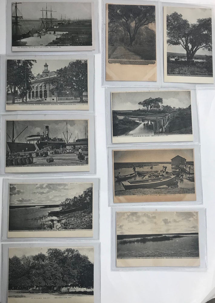 Item #58790 Views of Brunswick, Georgia, a collection of 23 unused real photo postcards, each 3 1/2 x 5 1/8 inches, picturing the town's architecture, waterfront, marshes, oak groves, and other features, and ocean bathers, dock workers, and fishermen at work and play.