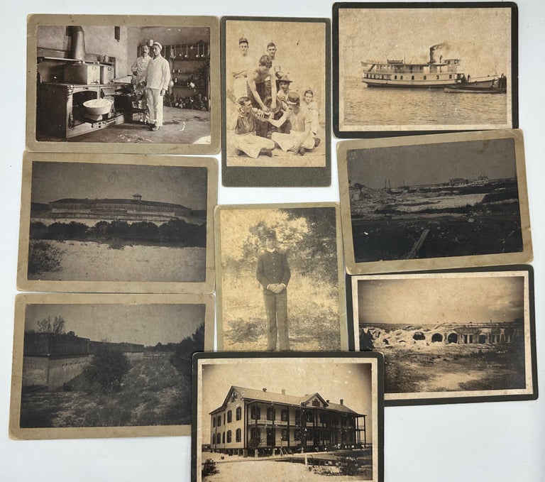 Item #63753 NINE ORIGINAL EARLY 20th CENTURY CABINET PHOTOS OF THE OLD CIVIL WAR ERA MILITARY INSTALLATIONS NEAR PENSACOLA, FLORIDA, INCLUDING AN IMAGE OF A GROUP OF YOUNG BATTERY SOLDIERS DECIDELY OFF-DUTY, MOST CAPTIONED ON VERSO BY FELLOW SOLDIER GEORGE BROWN, STATIONED THERE POST 1899.