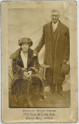 Item #67934 UNIDENTIFIED MIDDLE-AGE AFRICAN AMERICAN COUPLE, the man standing in suit and...
